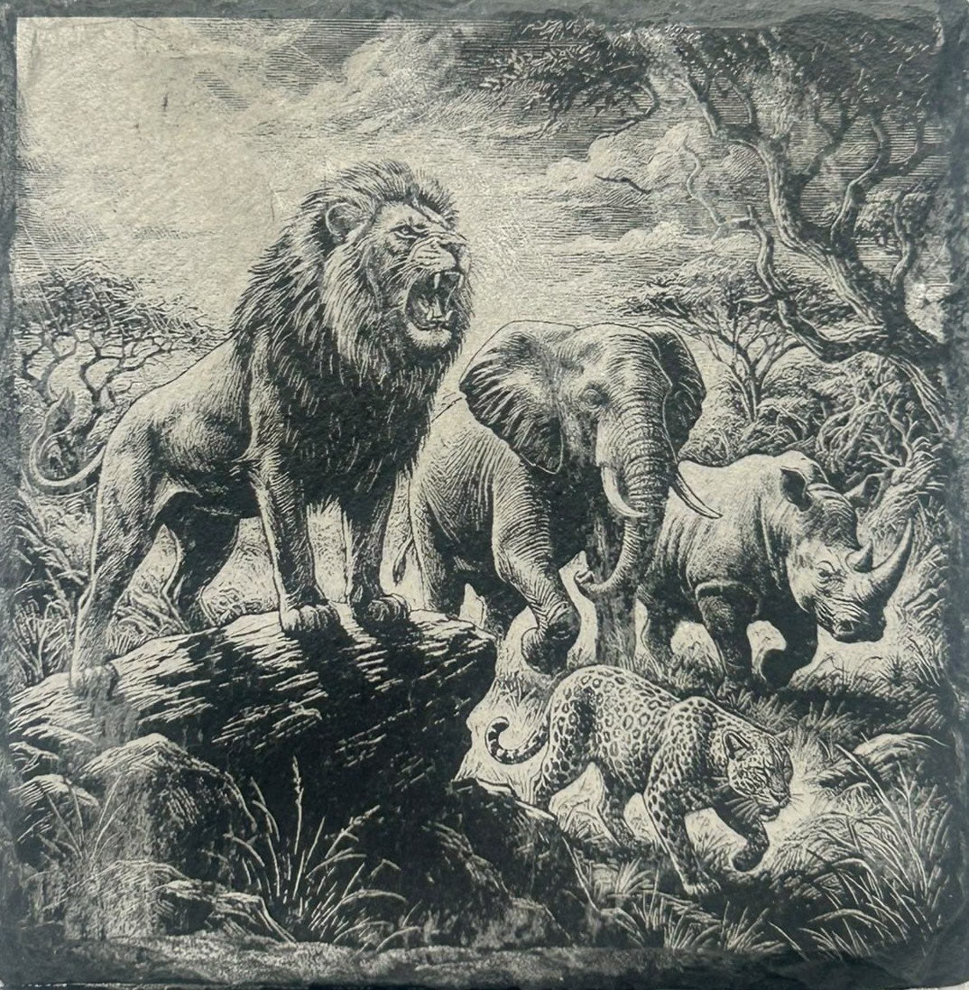 Engraved slate showing a group of wild animals