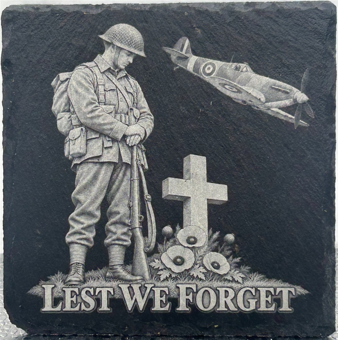 Remembrance design showing a soldier with bowed head beside a cross